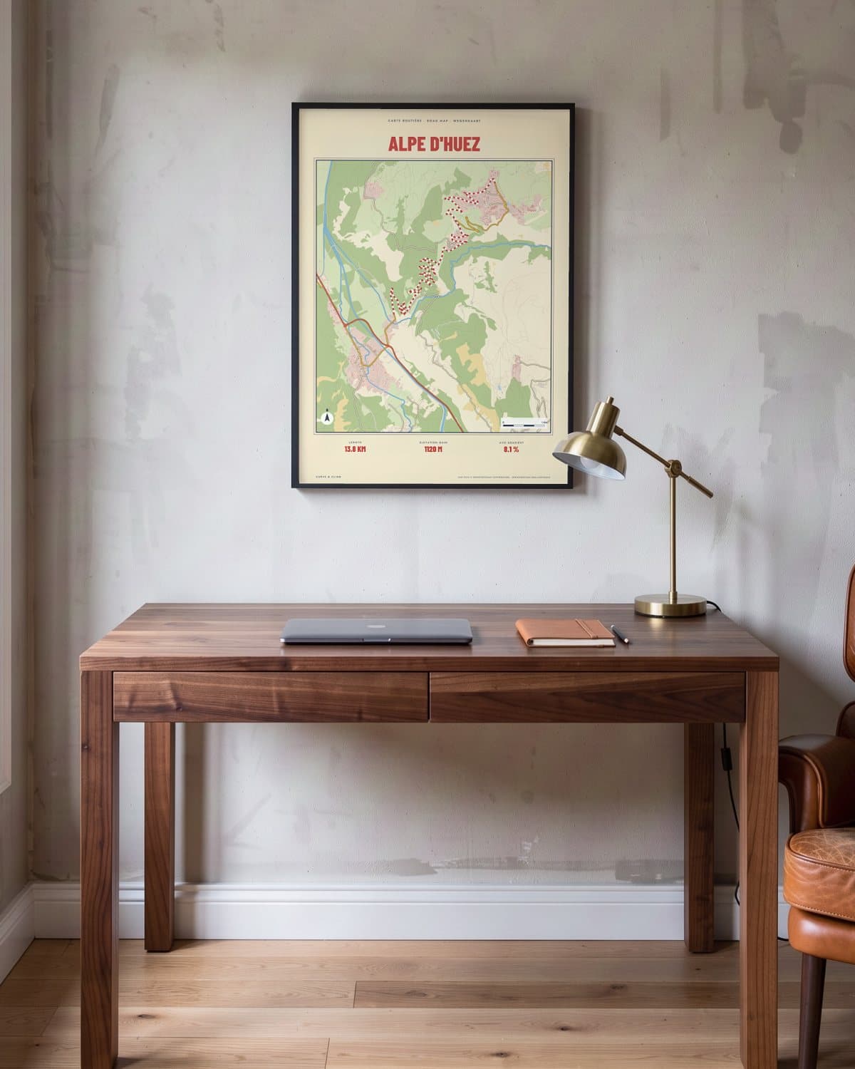 Alpe d'Huez Carte Routière map poster in a black frame (45 × 60 cm) in a home office