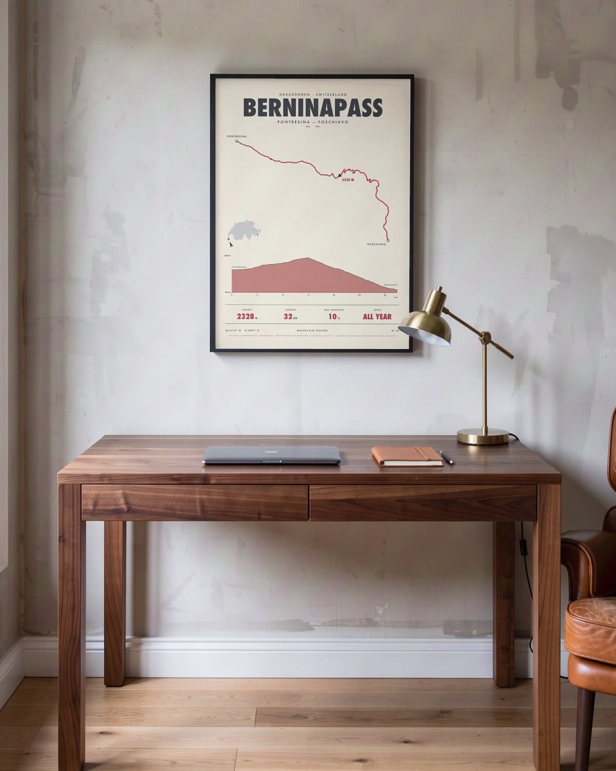 Berninapass mountain pass poster in a black frame (45 × 60 cm) in a home office
