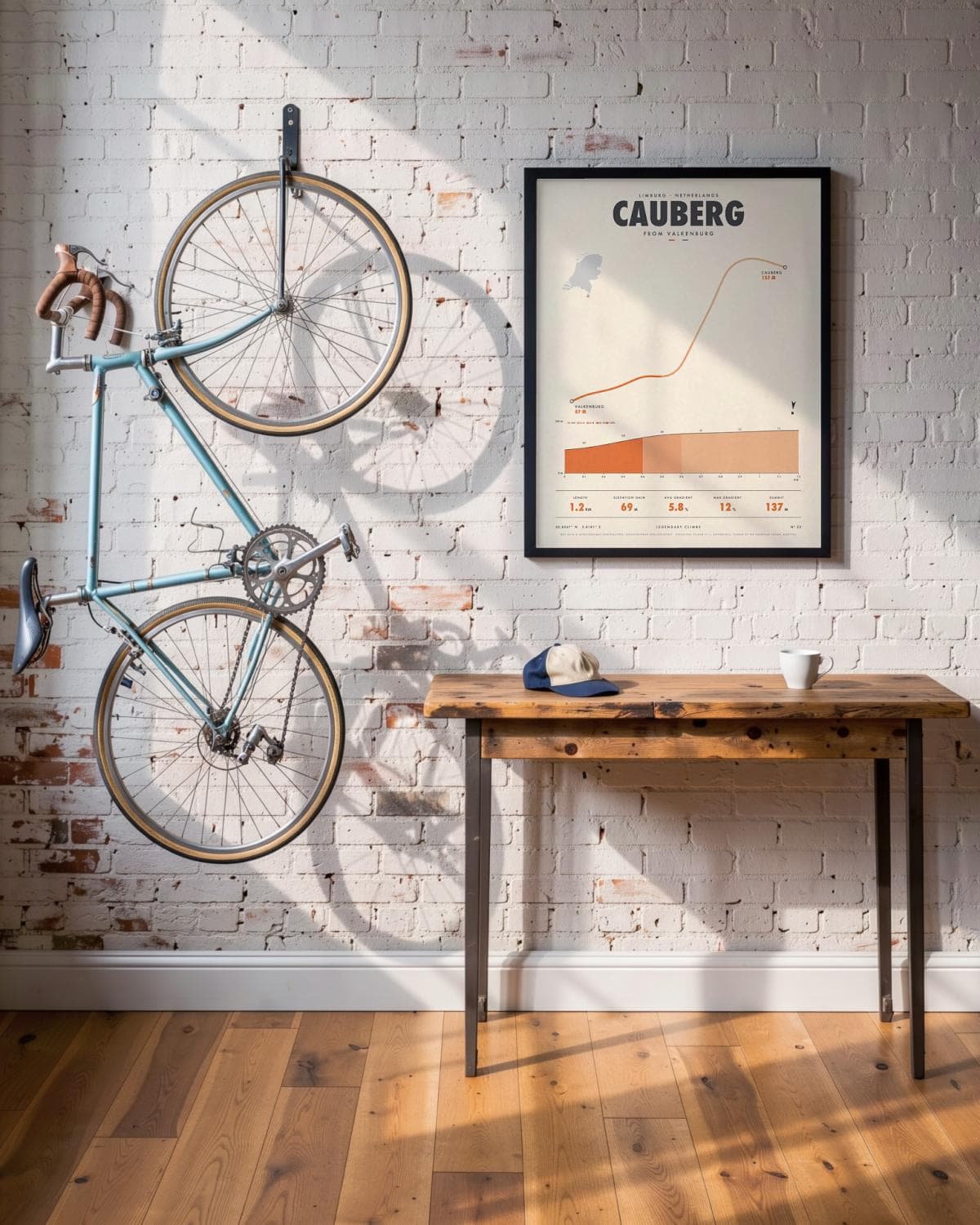 Cauberg cycling climb poster in a black frame (45 × 60 cm) in a brick loft with a vintage bike
