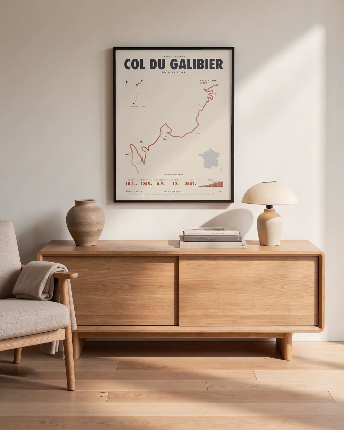 Col du Galibier cycling climb poster in a black frame (45 × 60 cm) in a living room