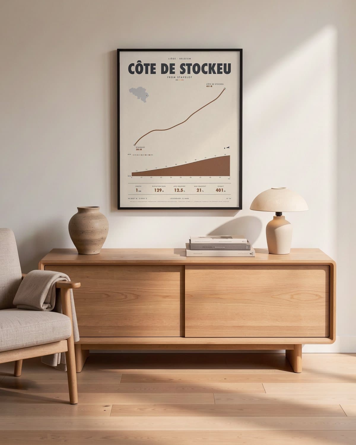 Côte de Stockeu cycling climb poster in a black frame (45 × 60 cm) in a living room