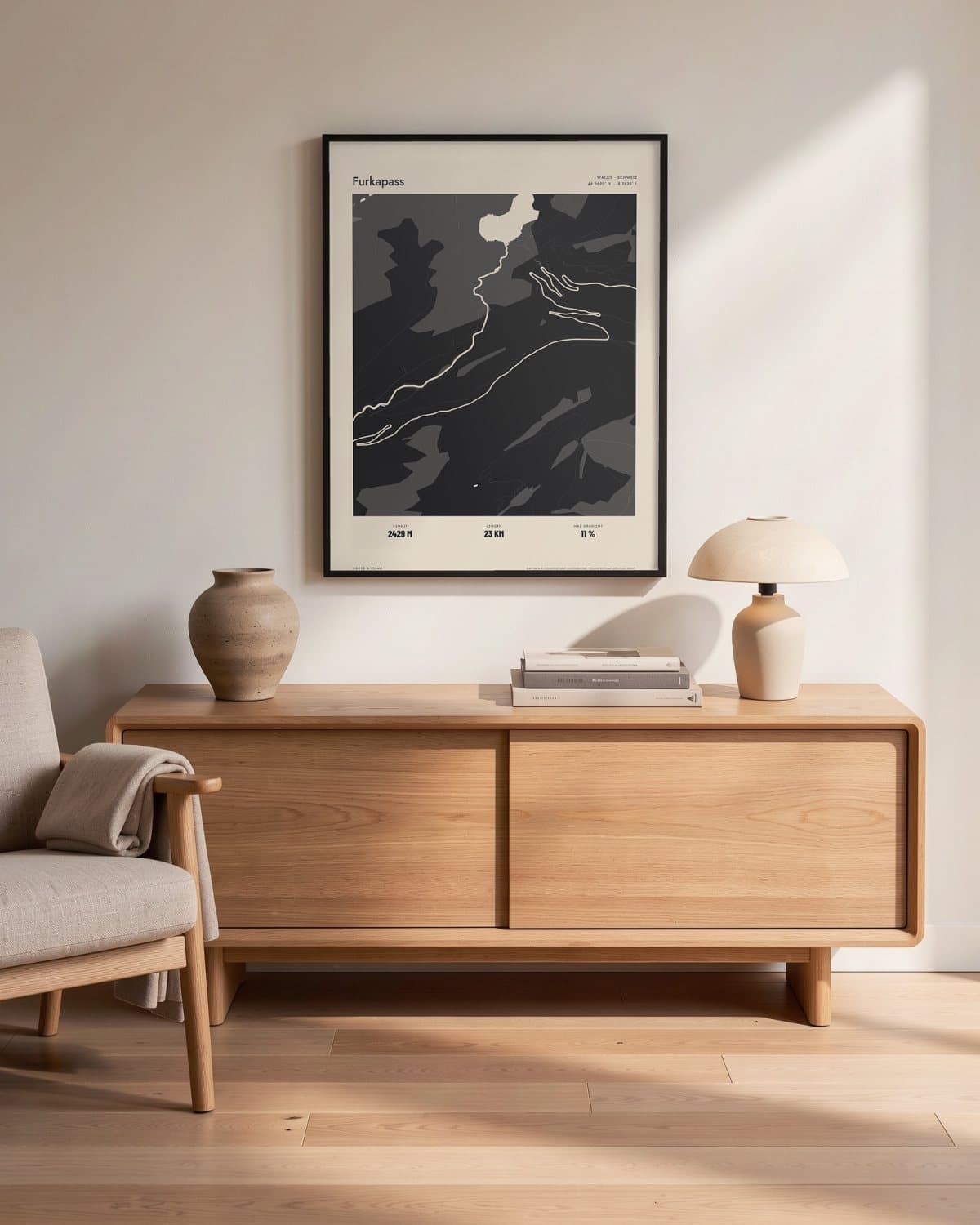 Furkapass Atlas Black map poster in a black frame (45 × 60 cm) in a living room
