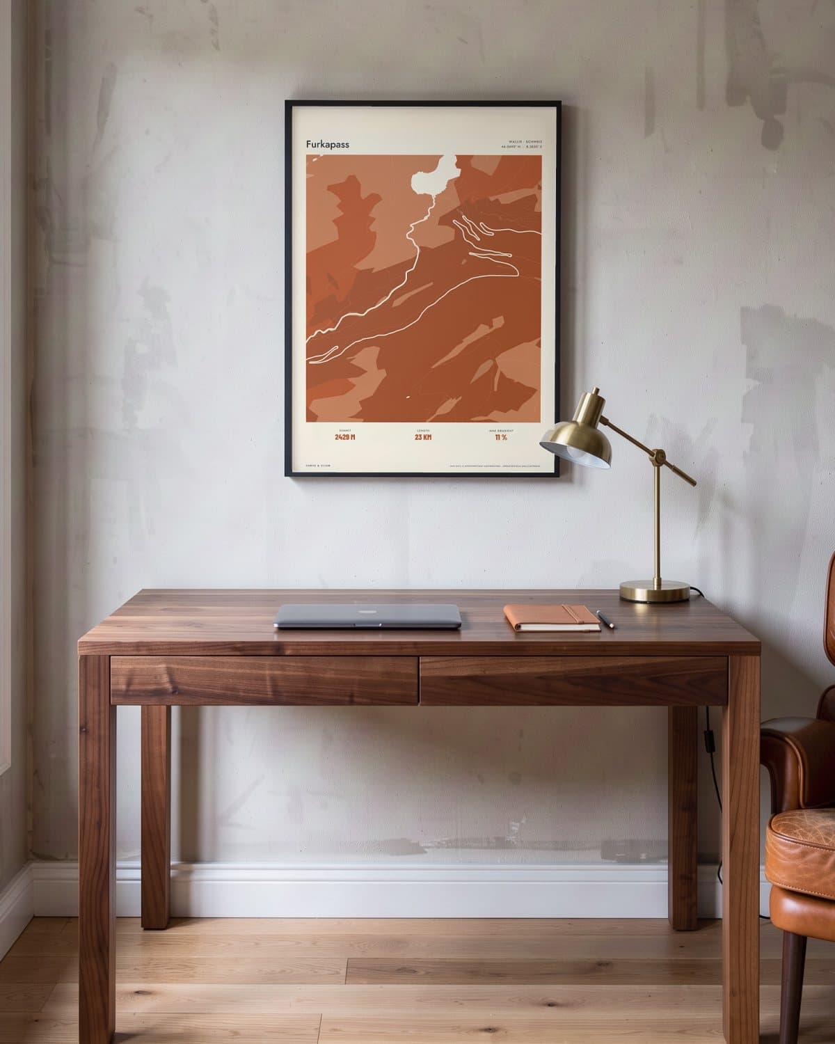 Furkapass Atlas Burnt Orange map poster in a black frame (45 × 60 cm) in a home office