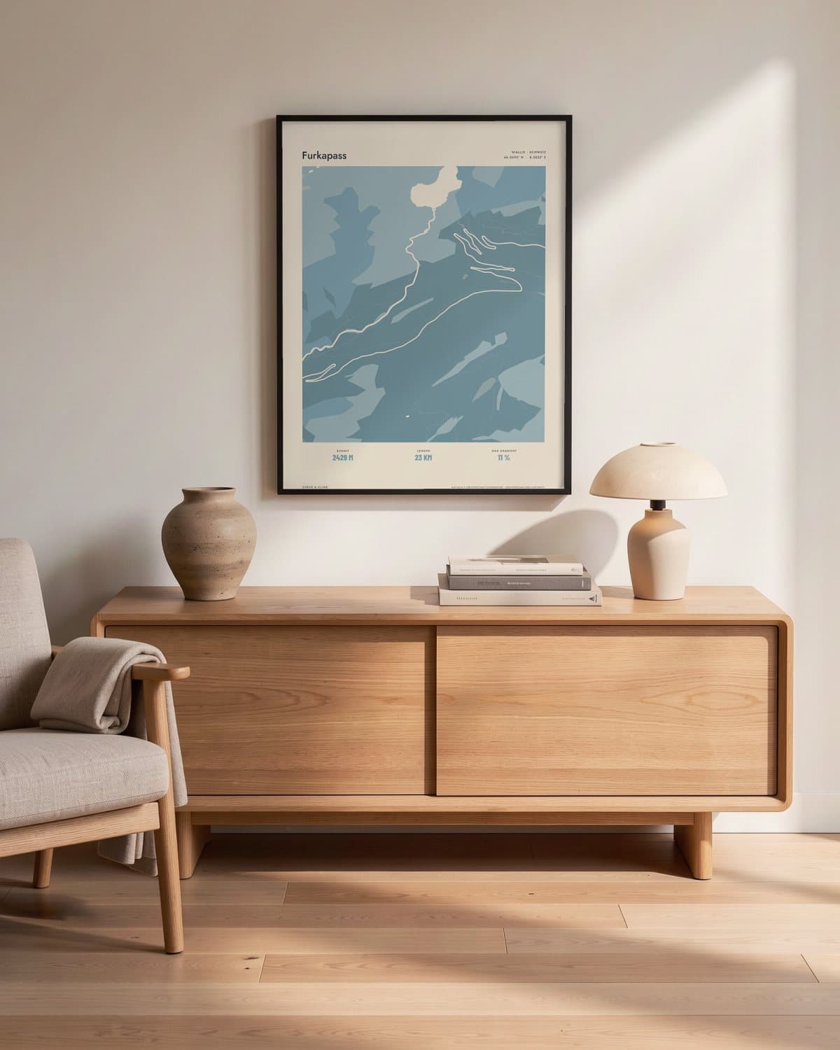 Furkapass Atlas Dusky Blue map poster in a black frame (45 × 60 cm) in a living room
