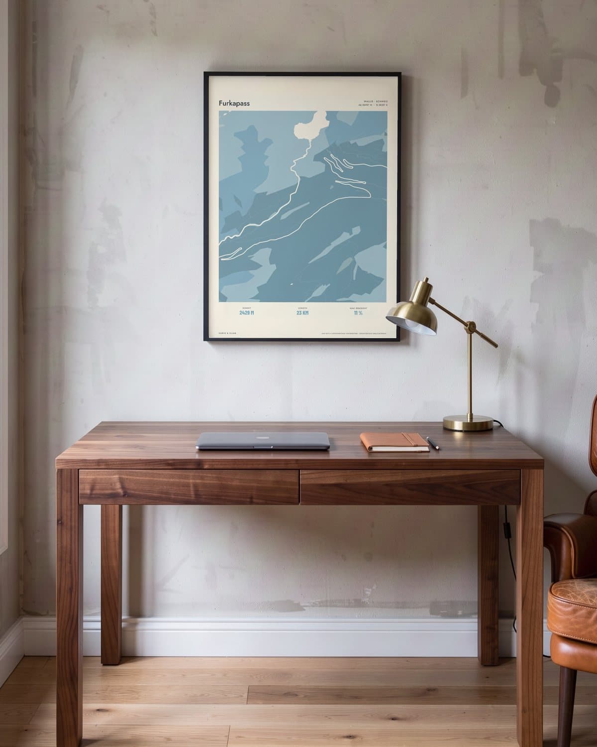 Furkapass Atlas Dusky Blue map poster in a black frame (45 × 60 cm) in a home office