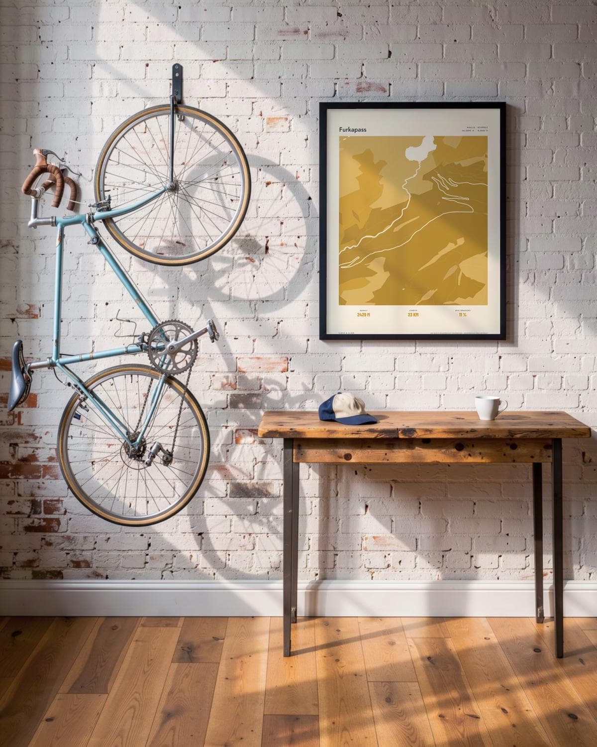 Furkapass Atlas Mustard map poster in a black frame (45 × 60 cm) in a brick loft with a vintage bike
