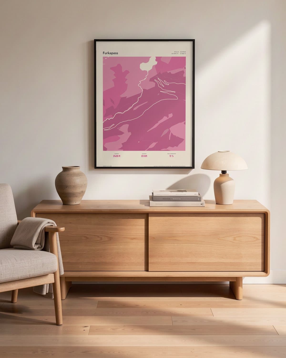 Furkapass Atlas Pink map poster in a black frame (45 × 60 cm) in a living room