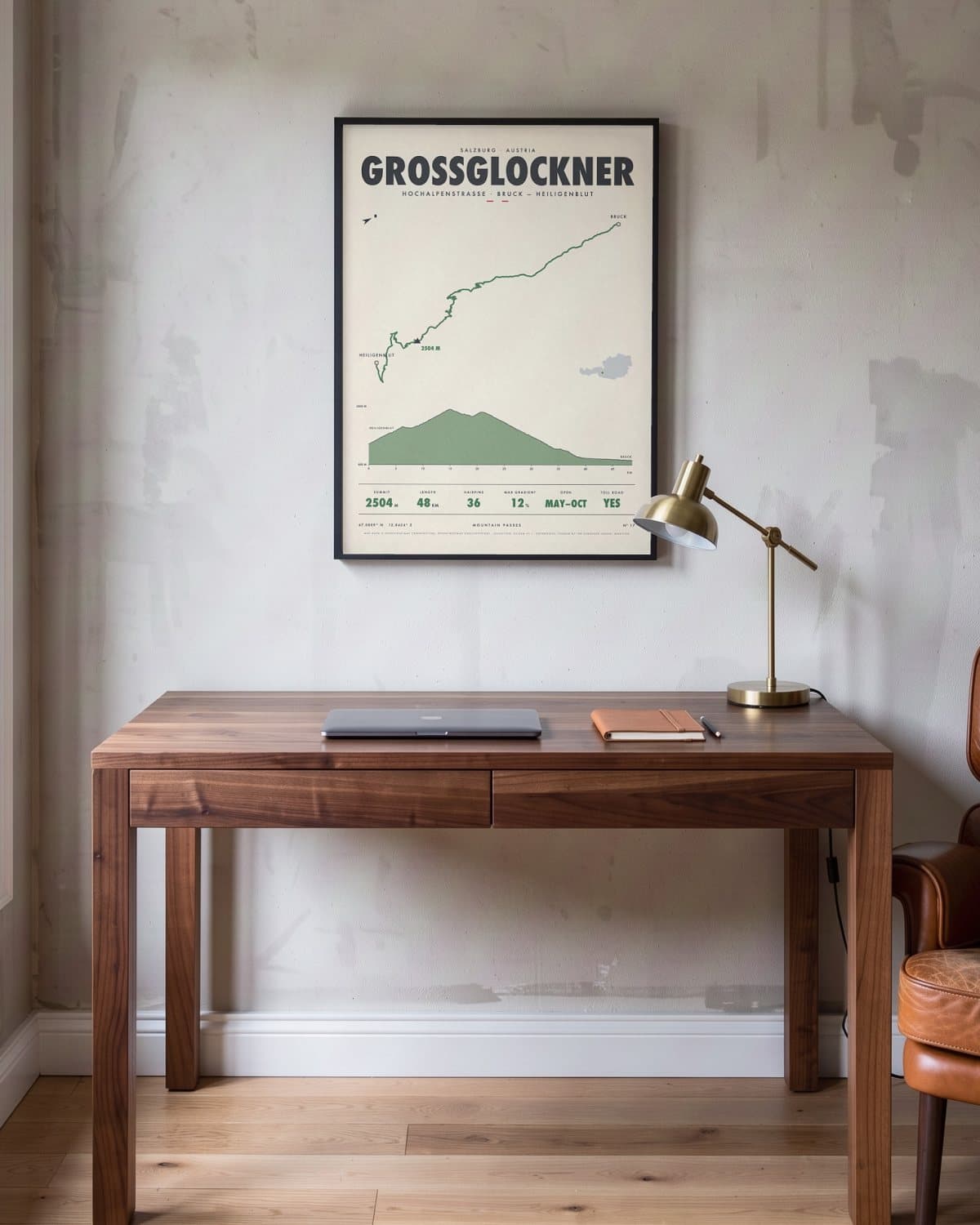 Grossglockner mountain pass poster in a black frame (45 × 60 cm) in a home office