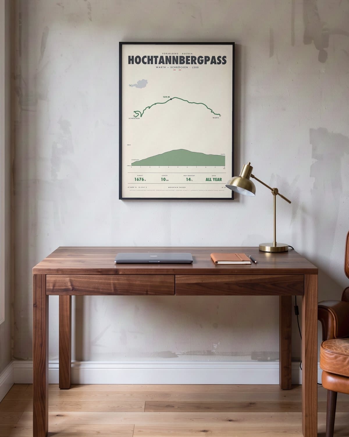 Hochtannbergpass mountain pass poster in a black frame (45 × 60 cm) in a home office