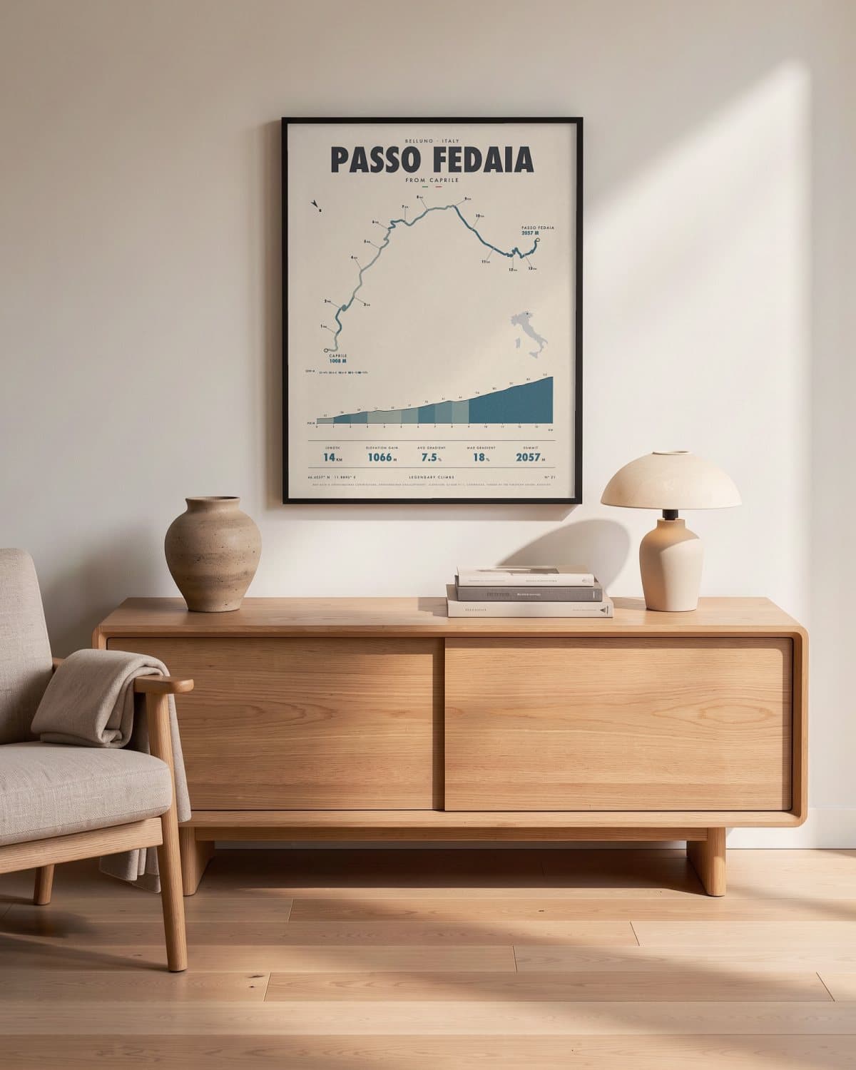 Passo Fedaia cycling climb poster in a black frame (45 × 60 cm) in a living room