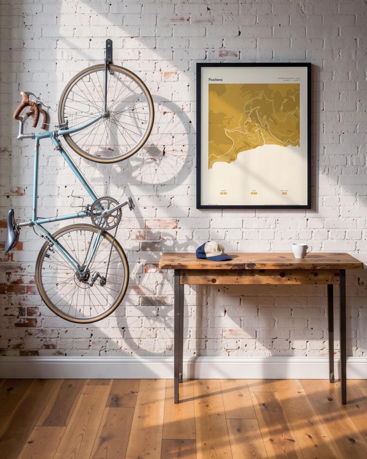 Positano Atlas Mustard kaartposter in een zwarte lijst (45 × 60 cm) in een loft met een klassieke racefiets
