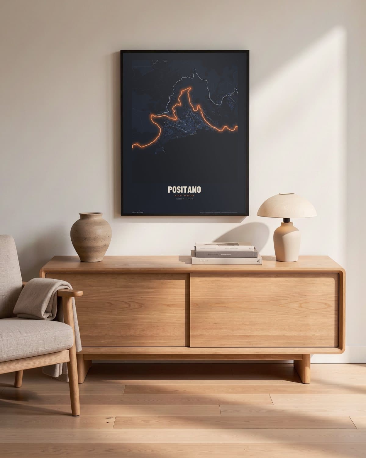 Positano Night Session map poster in a black frame (45 × 60 cm) in a living room