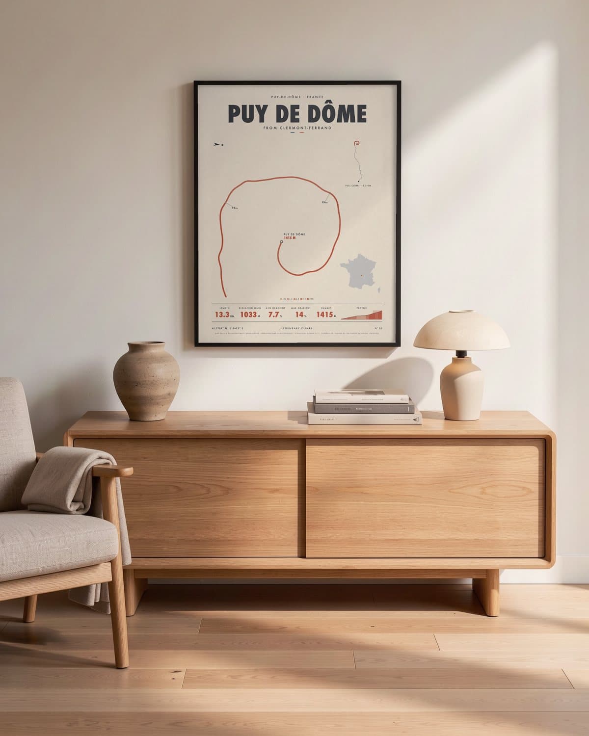 Puy de Dôme cycling climb poster in a black frame (45 × 60 cm) in a living room