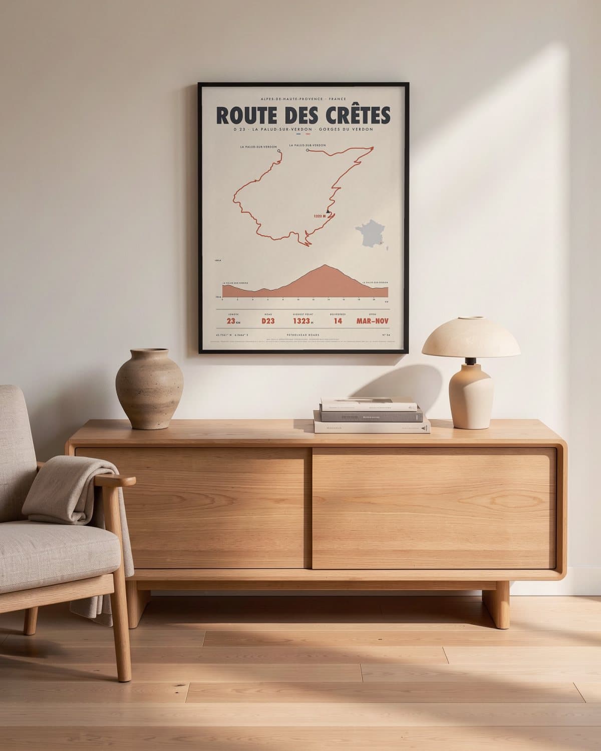 Route des Crêtes road poster in a black frame (45 × 60 cm) in a living room