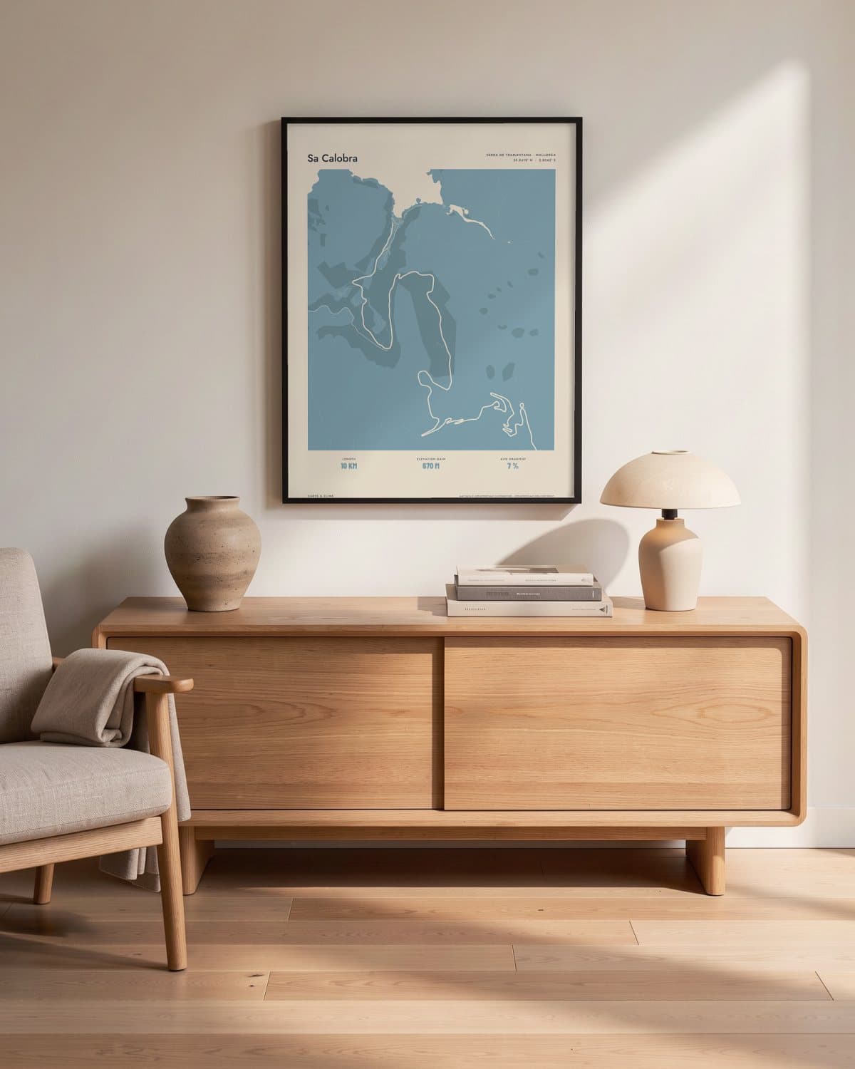 Sa Calobra Atlas Dusky Blue map poster in a black frame (45 × 60 cm) in a living room