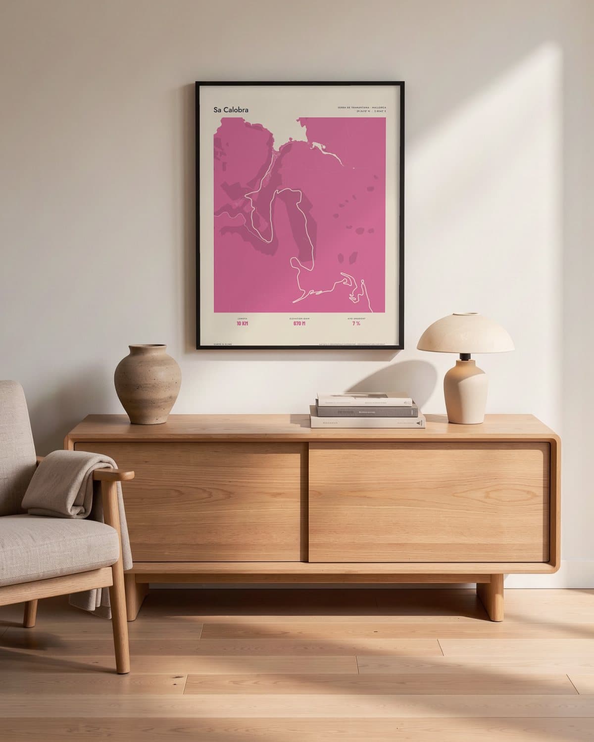 Sa Calobra Atlas Pink map poster in a black frame (45 × 60 cm) in a living room