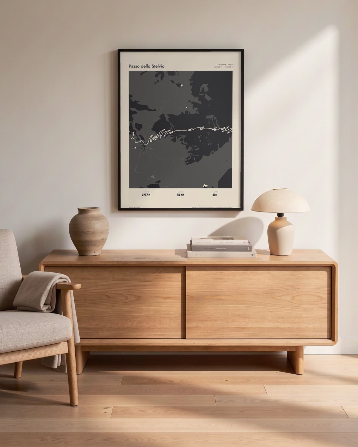 Passo dello Stelvio Atlas Black map poster in a black frame (45 × 60 cm) in a living room