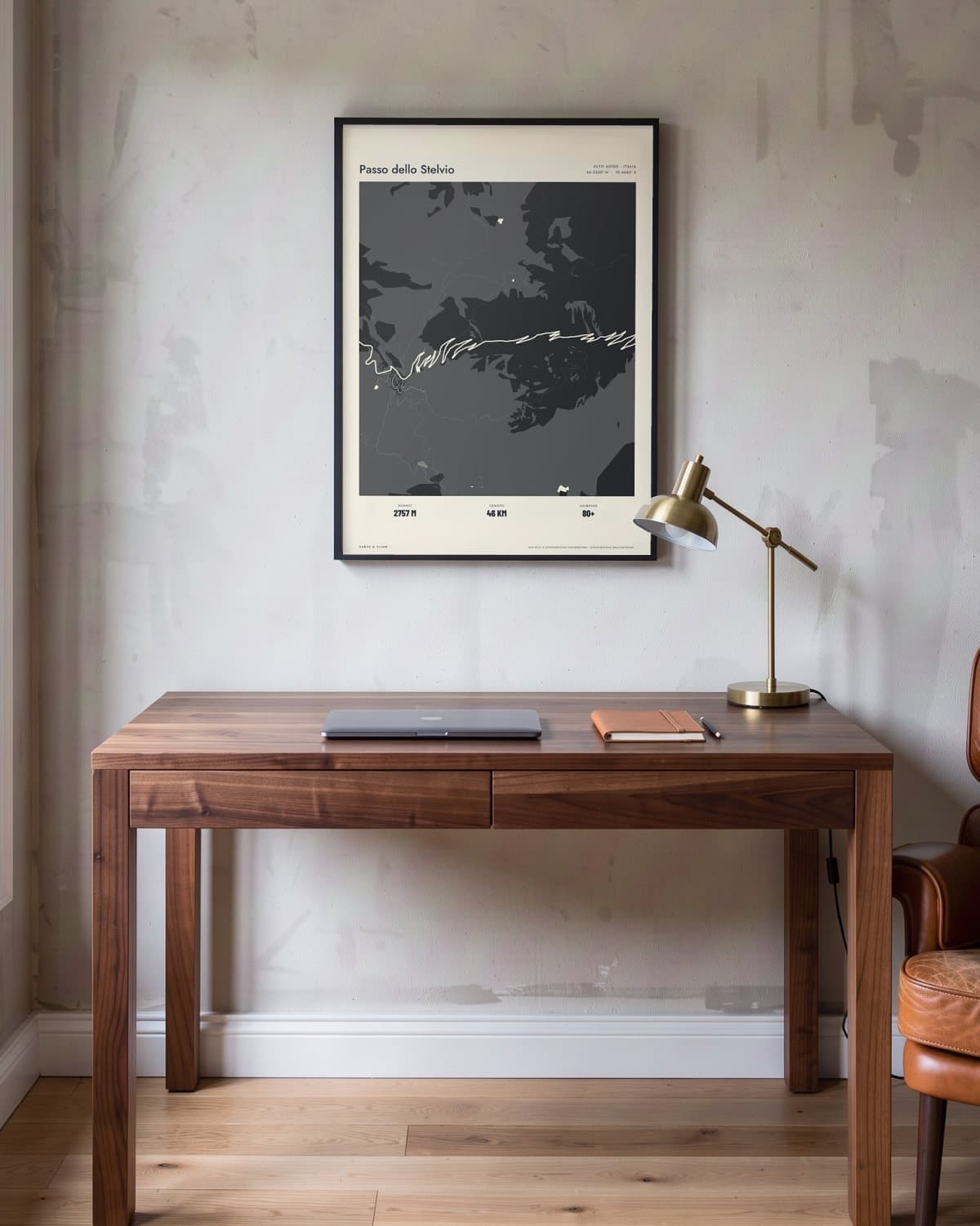 Passo dello Stelvio Atlas Black map poster in a black frame (45 × 60 cm) in a home office