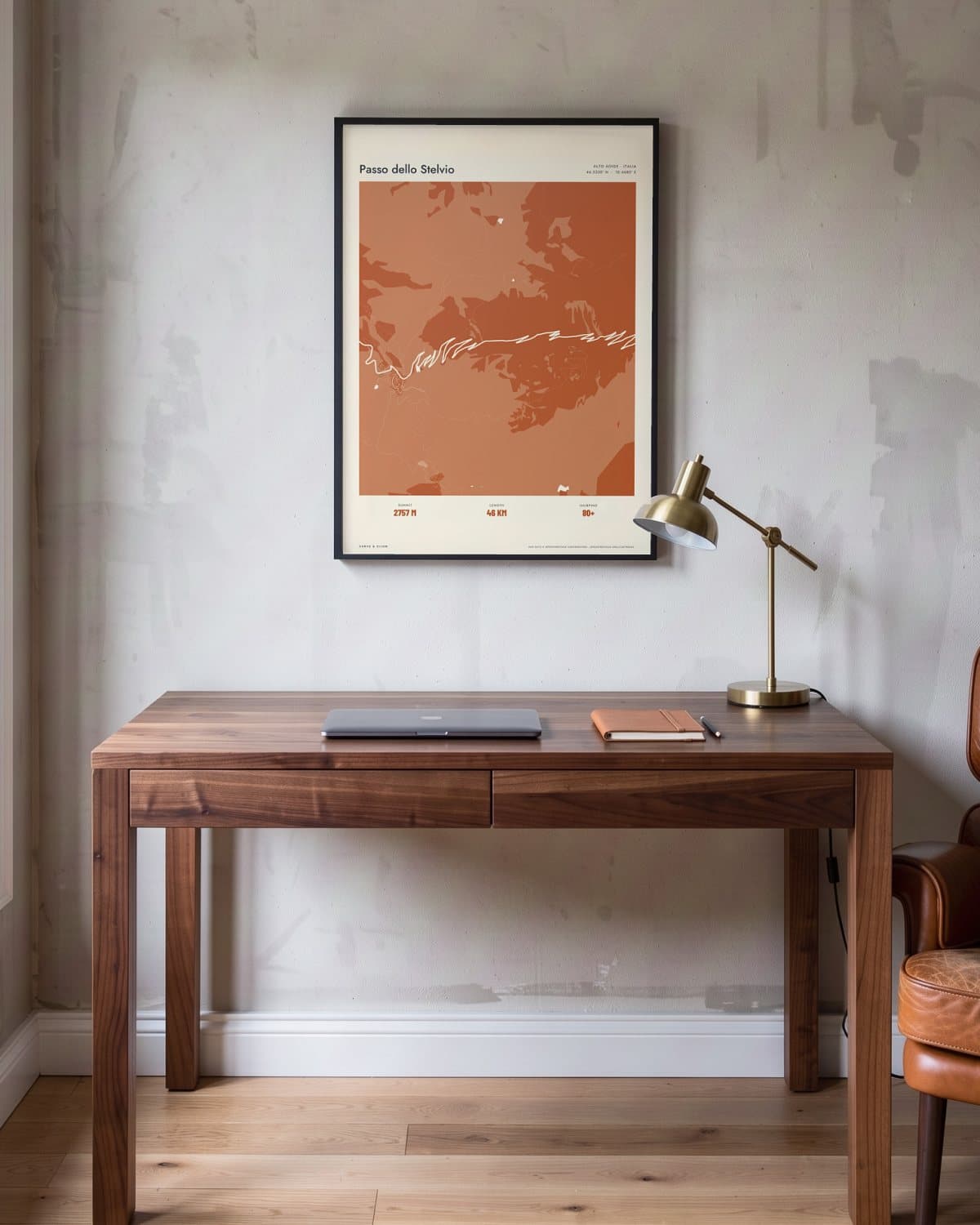 Passo dello Stelvio Atlas Burnt Orange map poster in a black frame (45 × 60 cm) in a home office