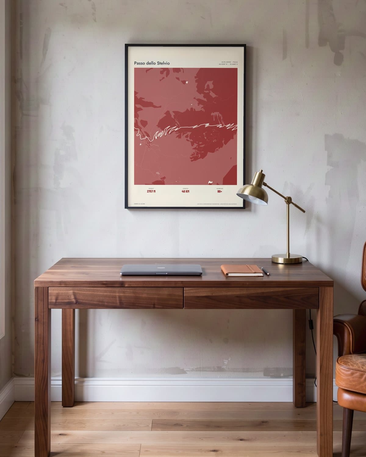 Passo dello Stelvio Atlas Deep Red map poster in a black frame (45 × 60 cm) in a home office