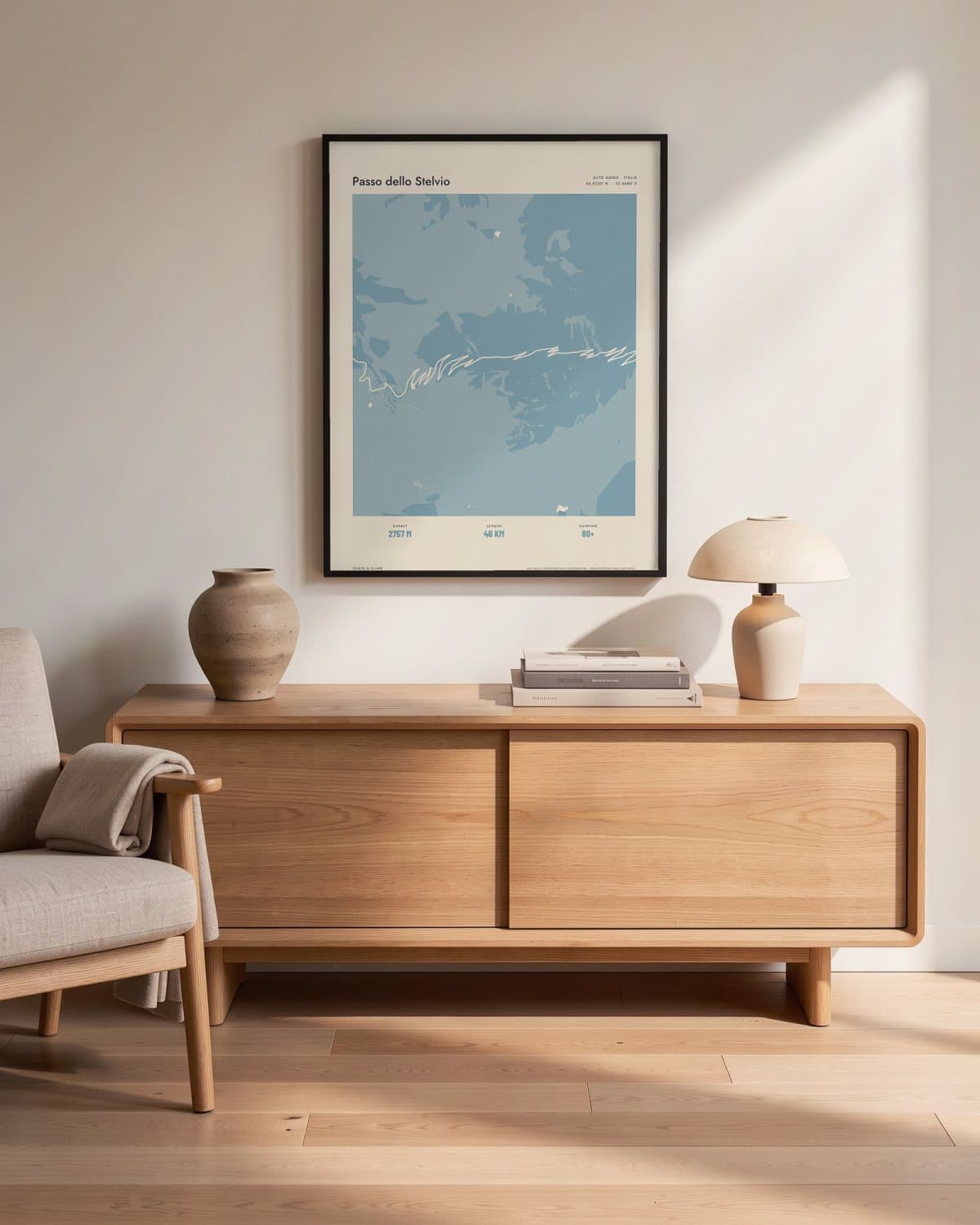 Passo dello Stelvio Atlas Dusky Blue map poster in a black frame (45 × 60 cm) in a living room