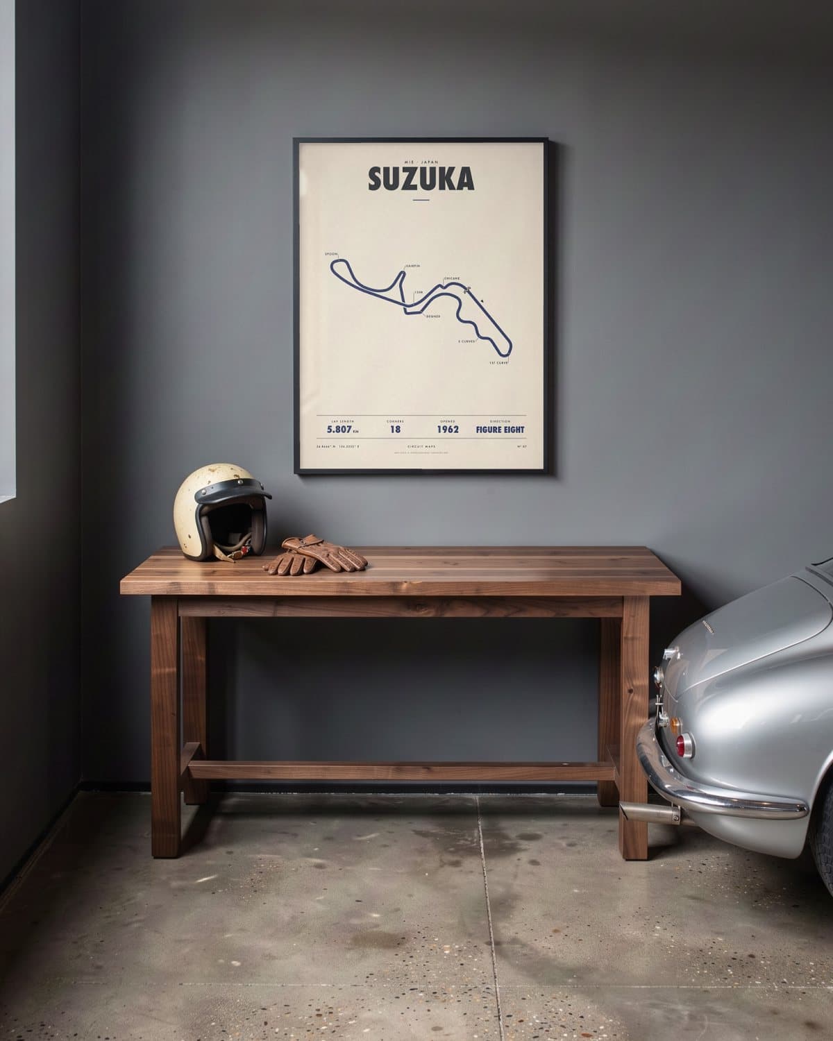 Suzuka circuit poster in a black frame (45 × 60 cm) in a home garage