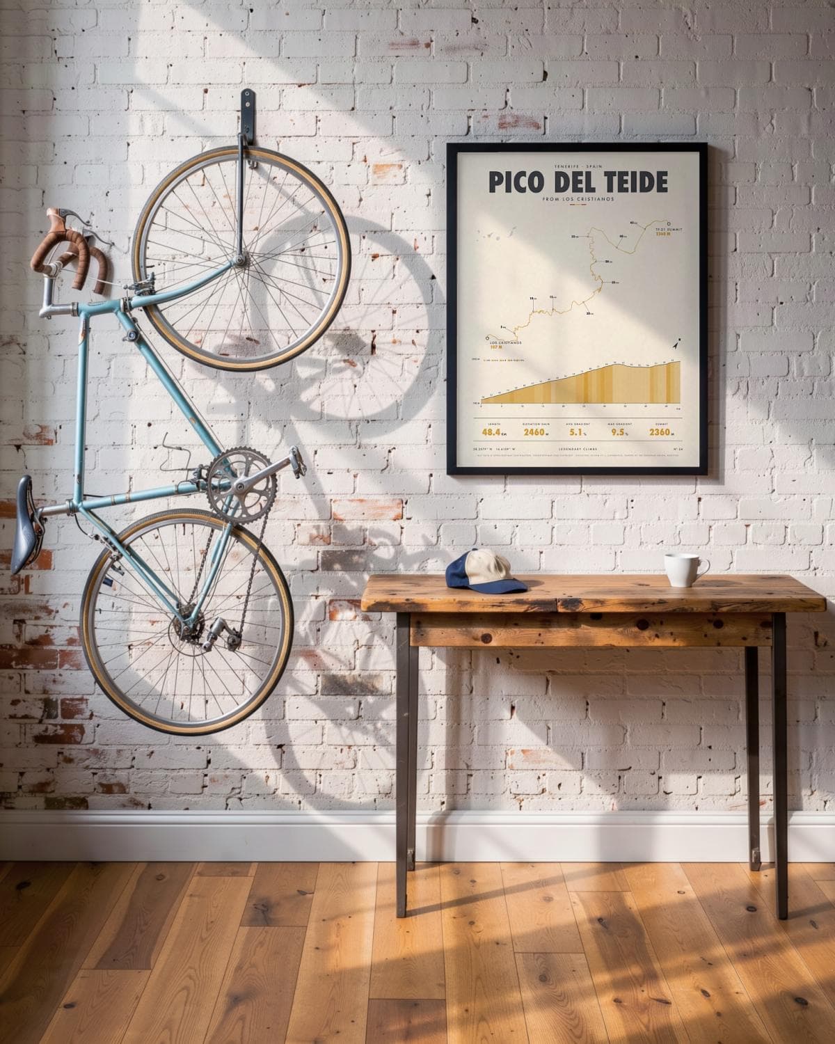 Pico del Teide cycling climb poster in a black frame (45 × 60 cm) in a brick loft with a vintage bike