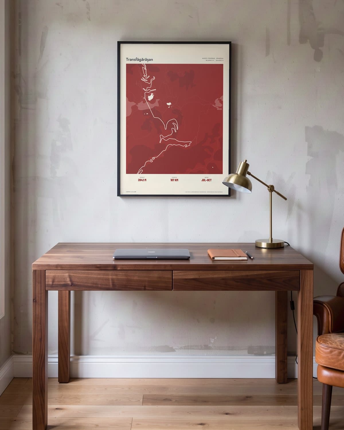 Transfăgărășan Atlas Deep Red map poster in a black frame (45 × 60 cm) in a home office