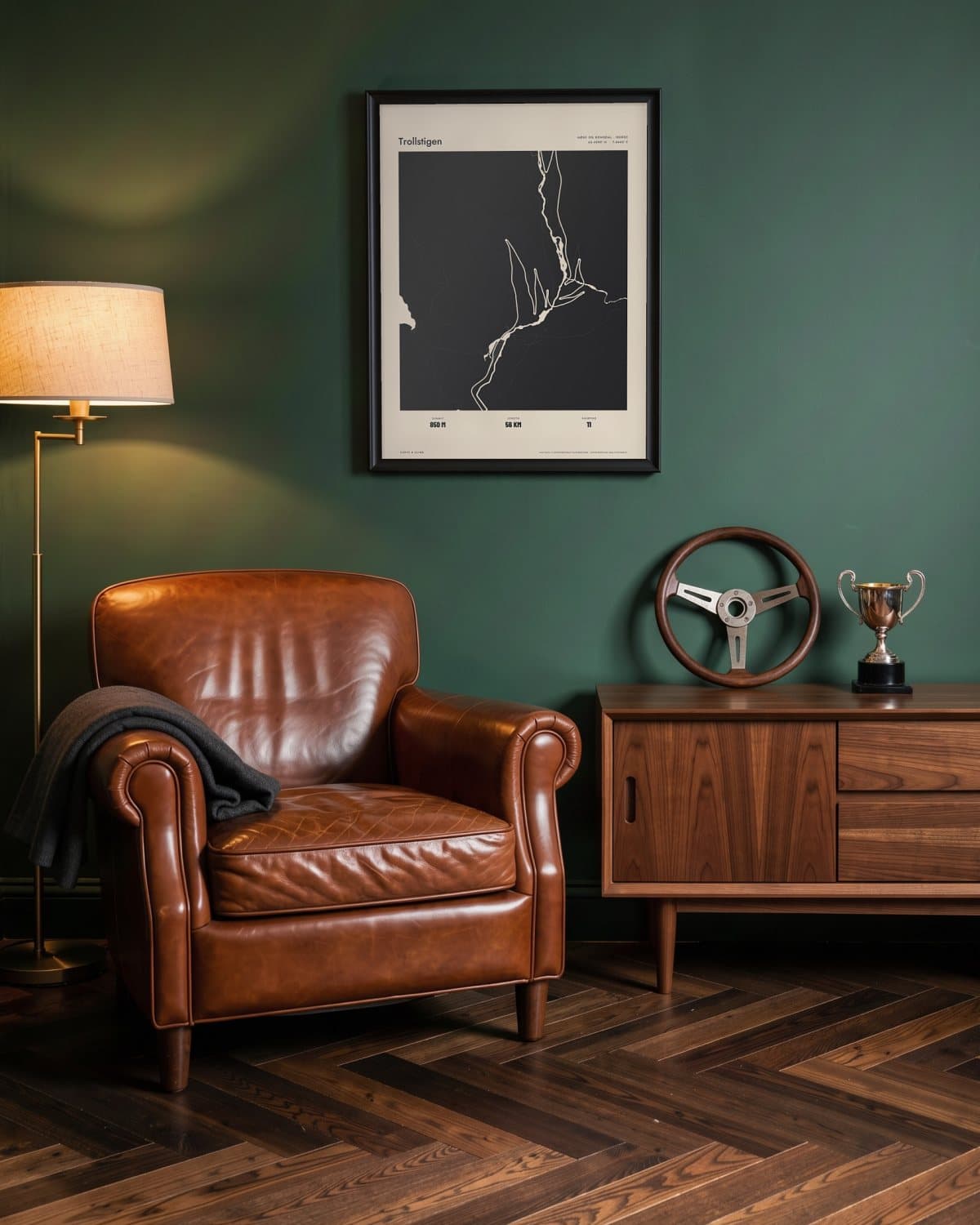 Trollstigen Atlas Black map poster in a black frame (45 × 60 cm) in a green den