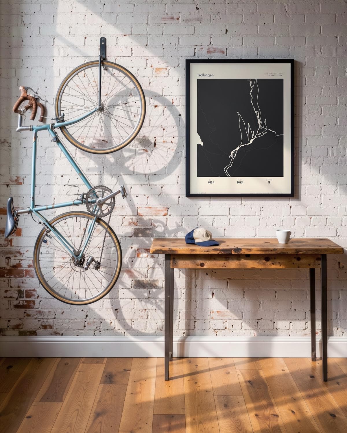 Trollstigen Atlas Black map poster in a black frame (45 × 60 cm) in a brick loft with a vintage bike