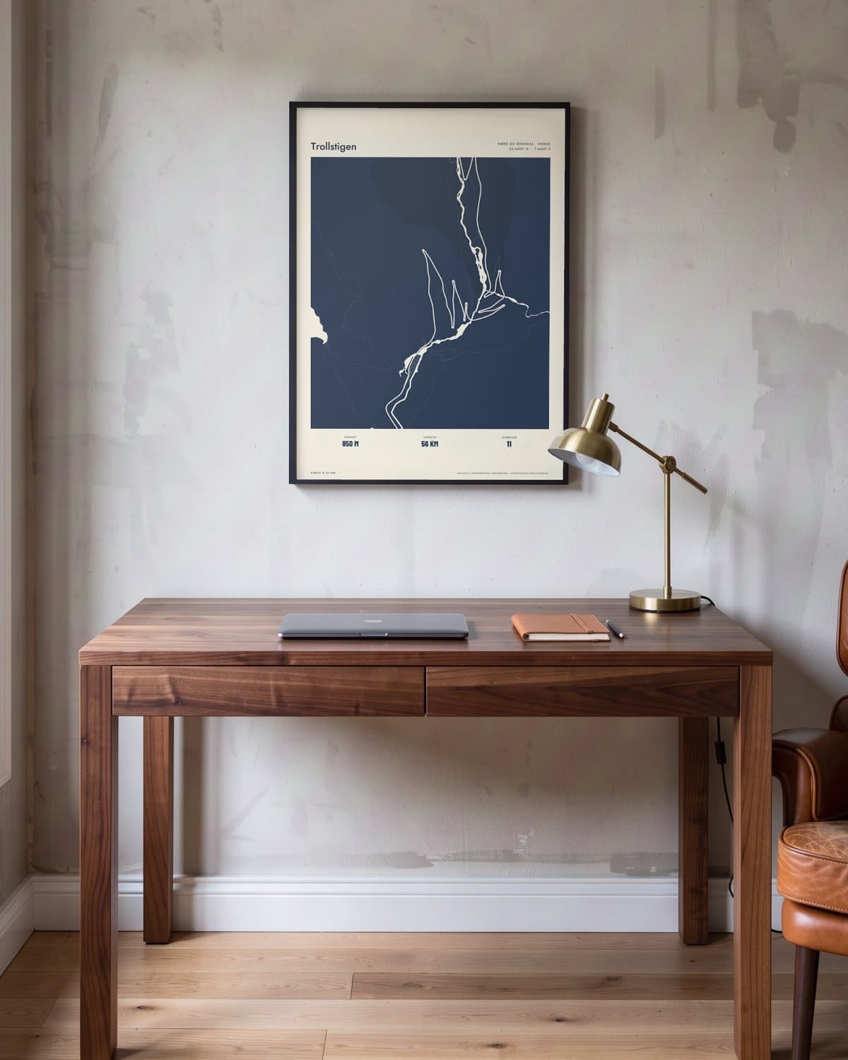 Trollstigen Atlas Navy map poster in a black frame (45 × 60 cm) in a home office