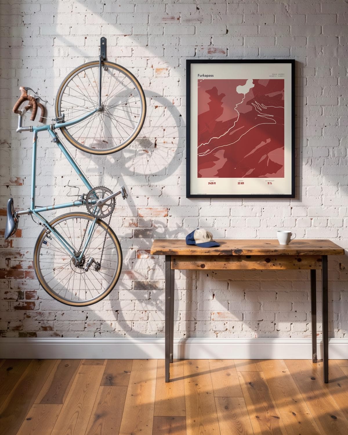 Furkapass Atlas Deep Red map poster in a black frame (45 × 60 cm) in a brick loft with a vintage bike