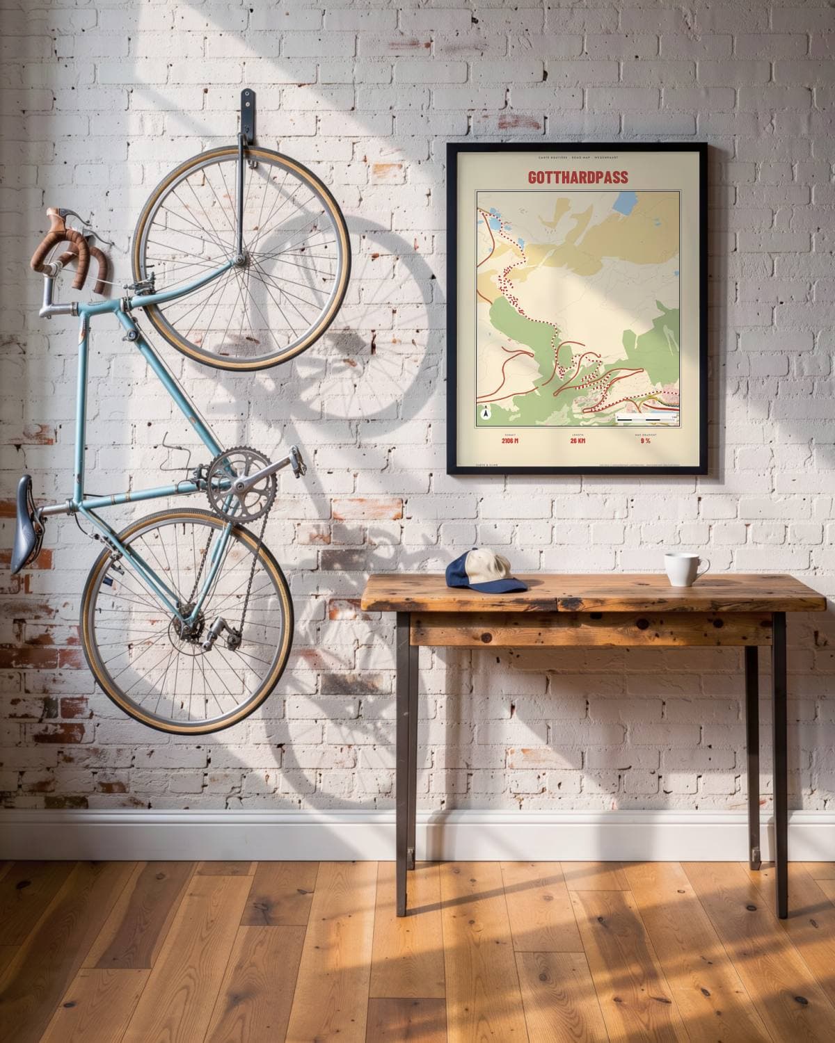 Gotthardpass Carte Routière map poster in a black frame (45 × 60 cm) in a brick loft with a vintage bike