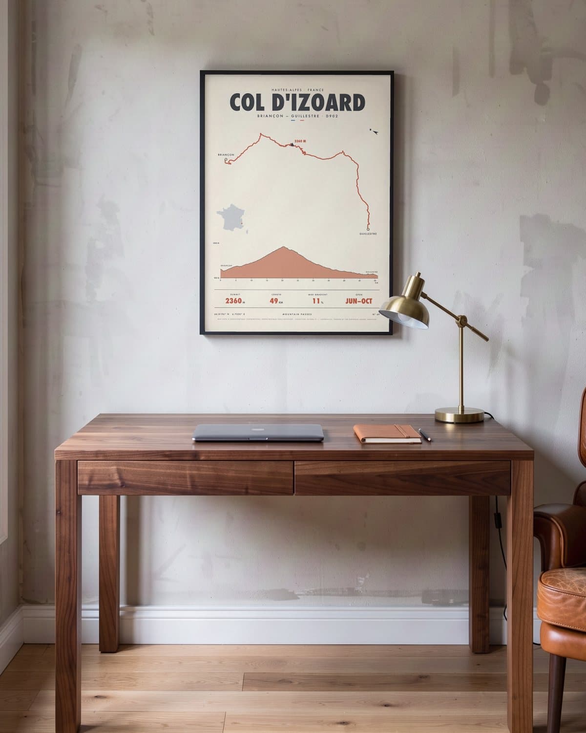 Col d'Izoard mountain pass poster in a black frame (45 × 60 cm) in a home office