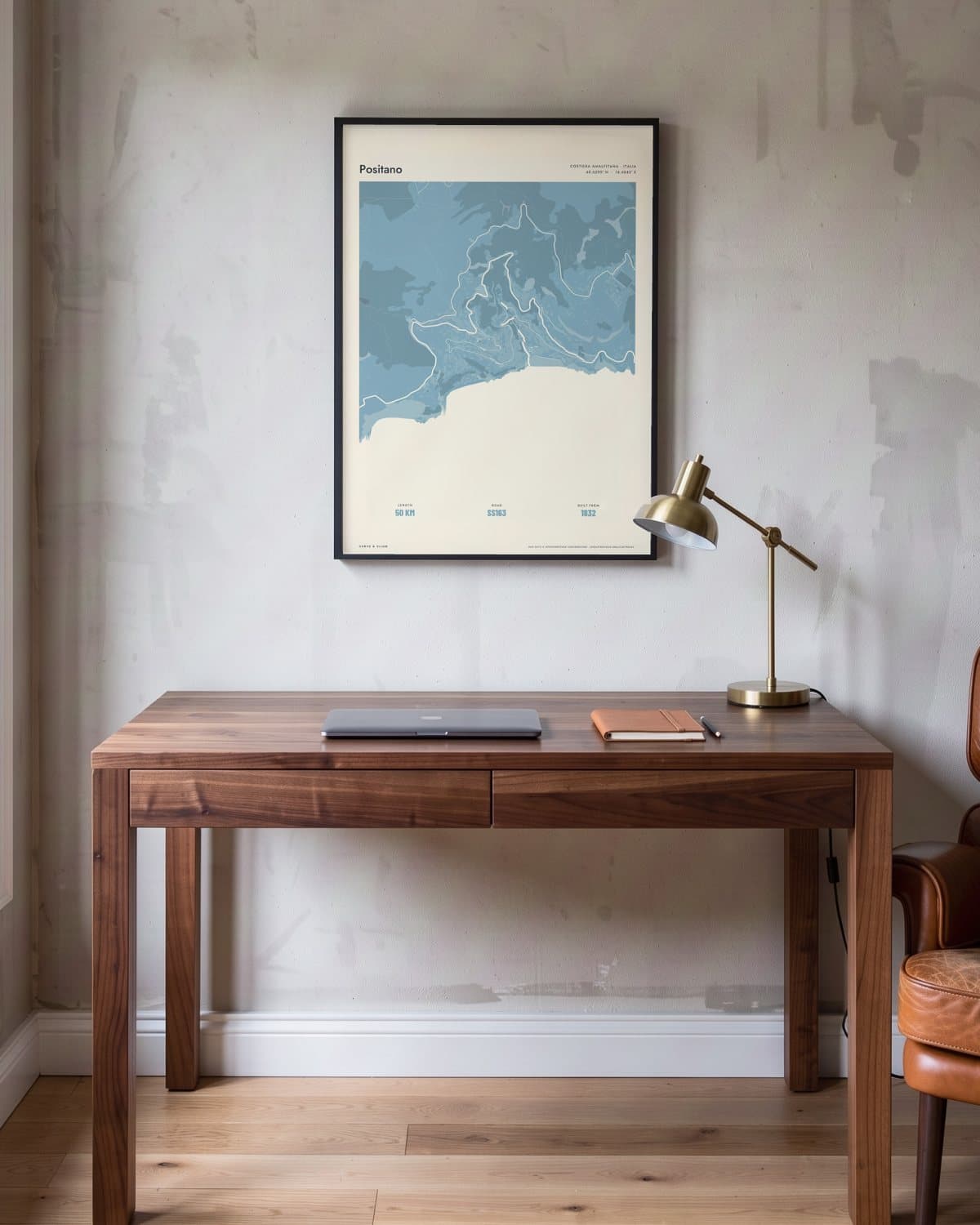 Positano Atlas Dusky Blue kaartposter in een zwarte lijst (45 × 60 cm) in een werkkamer