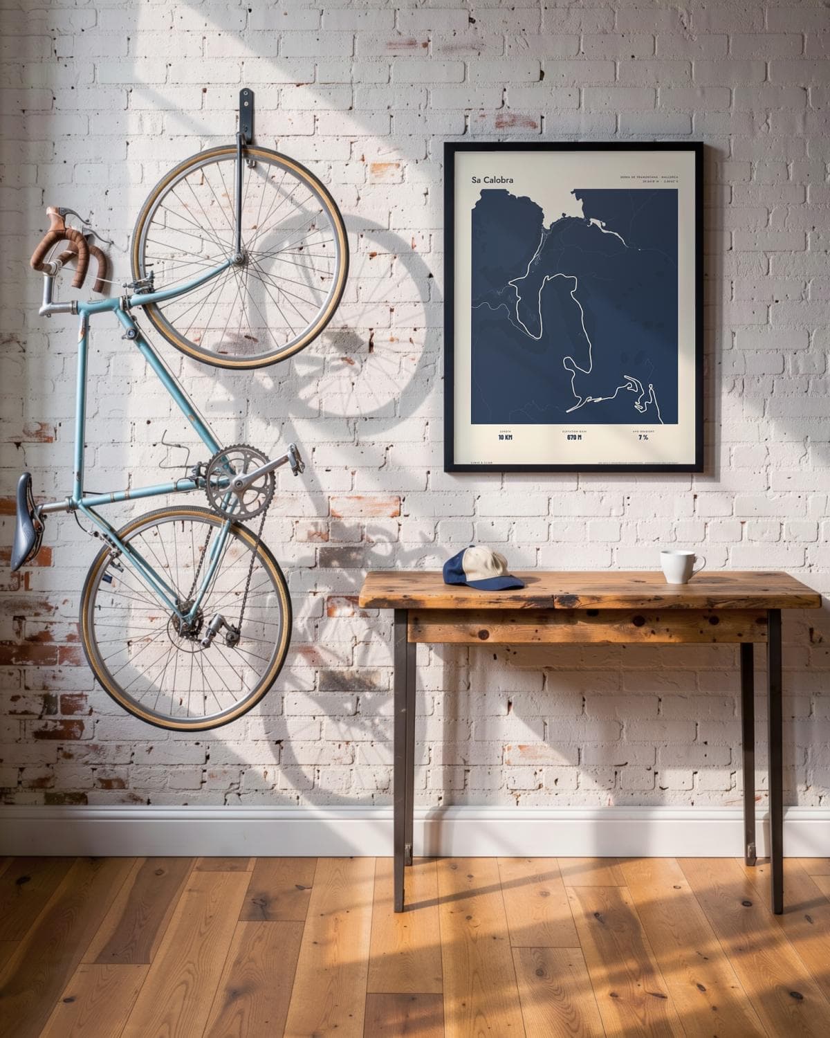 Sa Calobra Atlas Navy map poster in a black frame (45 × 60 cm) in a brick loft with a vintage bike