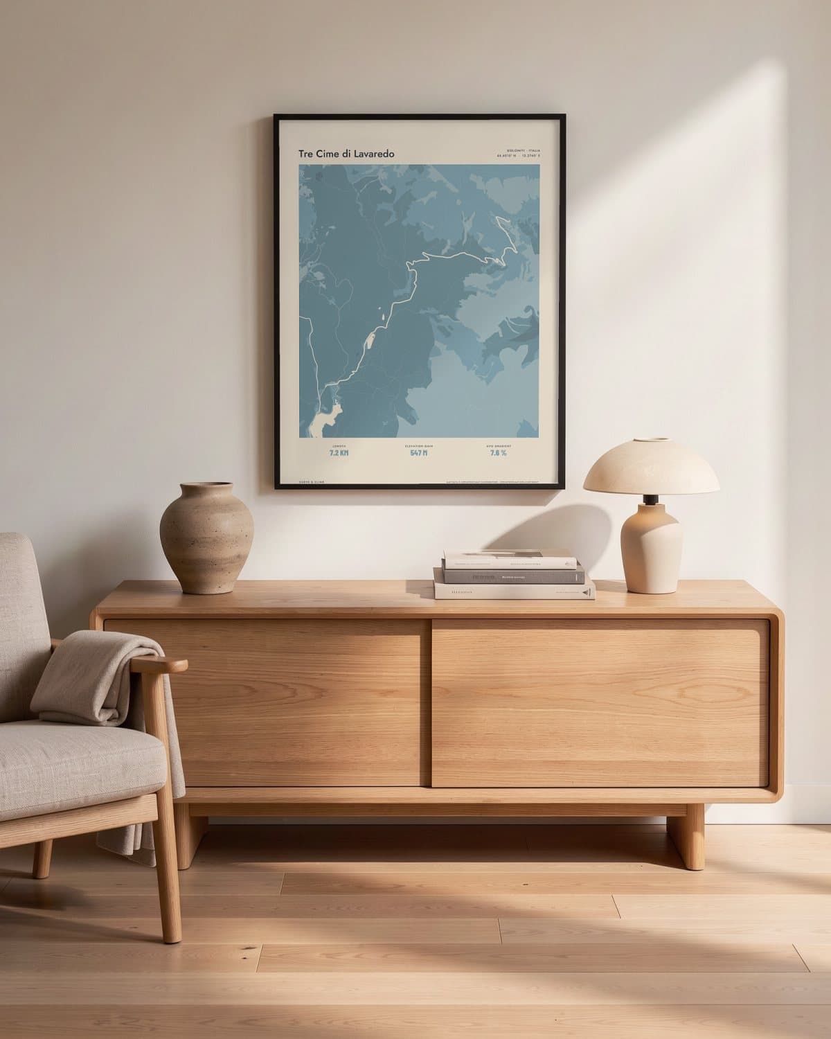 Tre Cime di Lavaredo Atlas Dusky Blue map poster in a black frame (45 × 60 cm) in a living room
