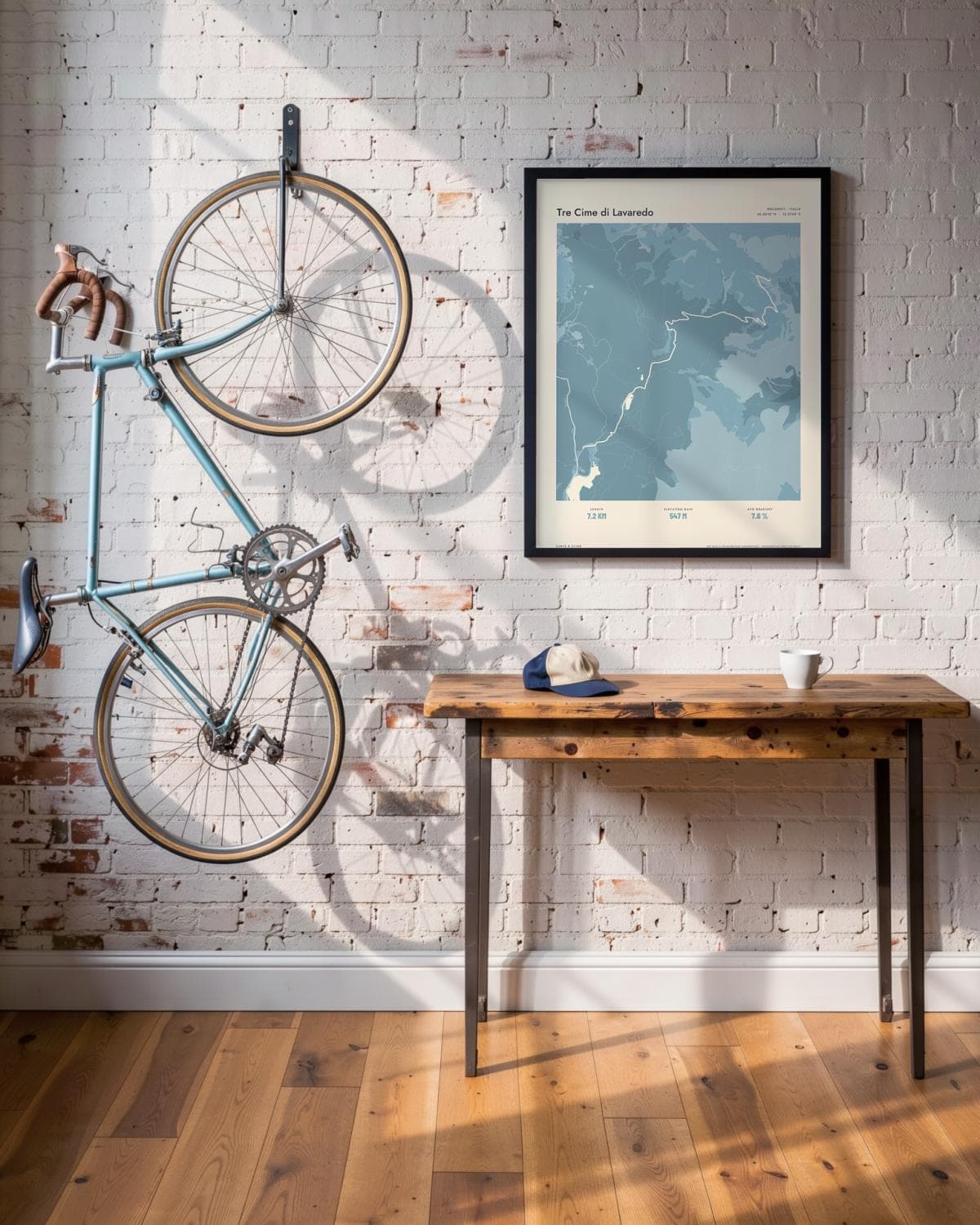 Tre Cime di Lavaredo Atlas Dusky Blue map poster in a black frame (45 × 60 cm) in a brick loft with a vintage bike