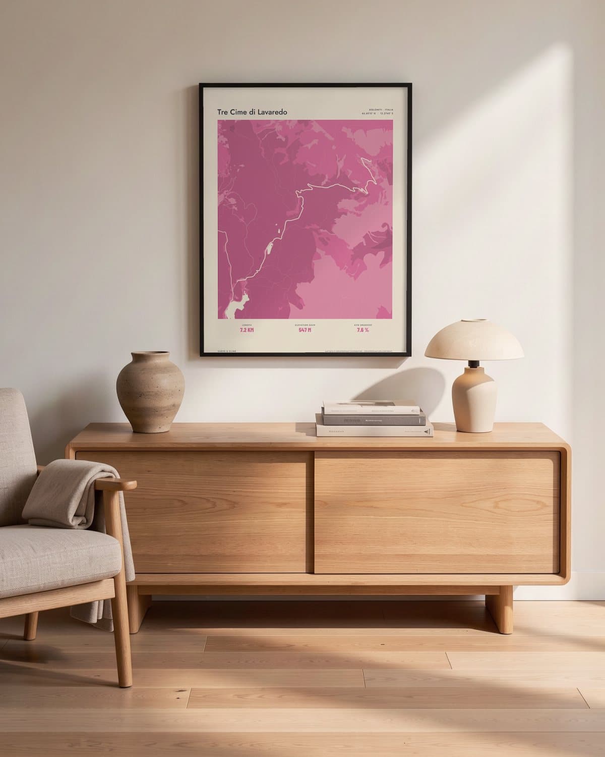Tre Cime di Lavaredo Atlas Pink map poster in a black frame (45 × 60 cm) in a living room