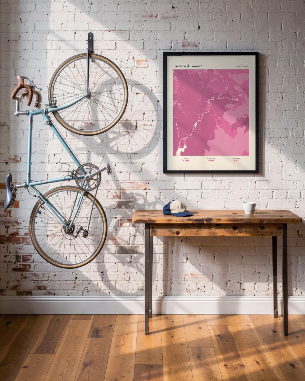 Tre Cime di Lavaredo Atlas Pink map poster in a black frame (45 × 60 cm) in a brick loft with a vintage bike