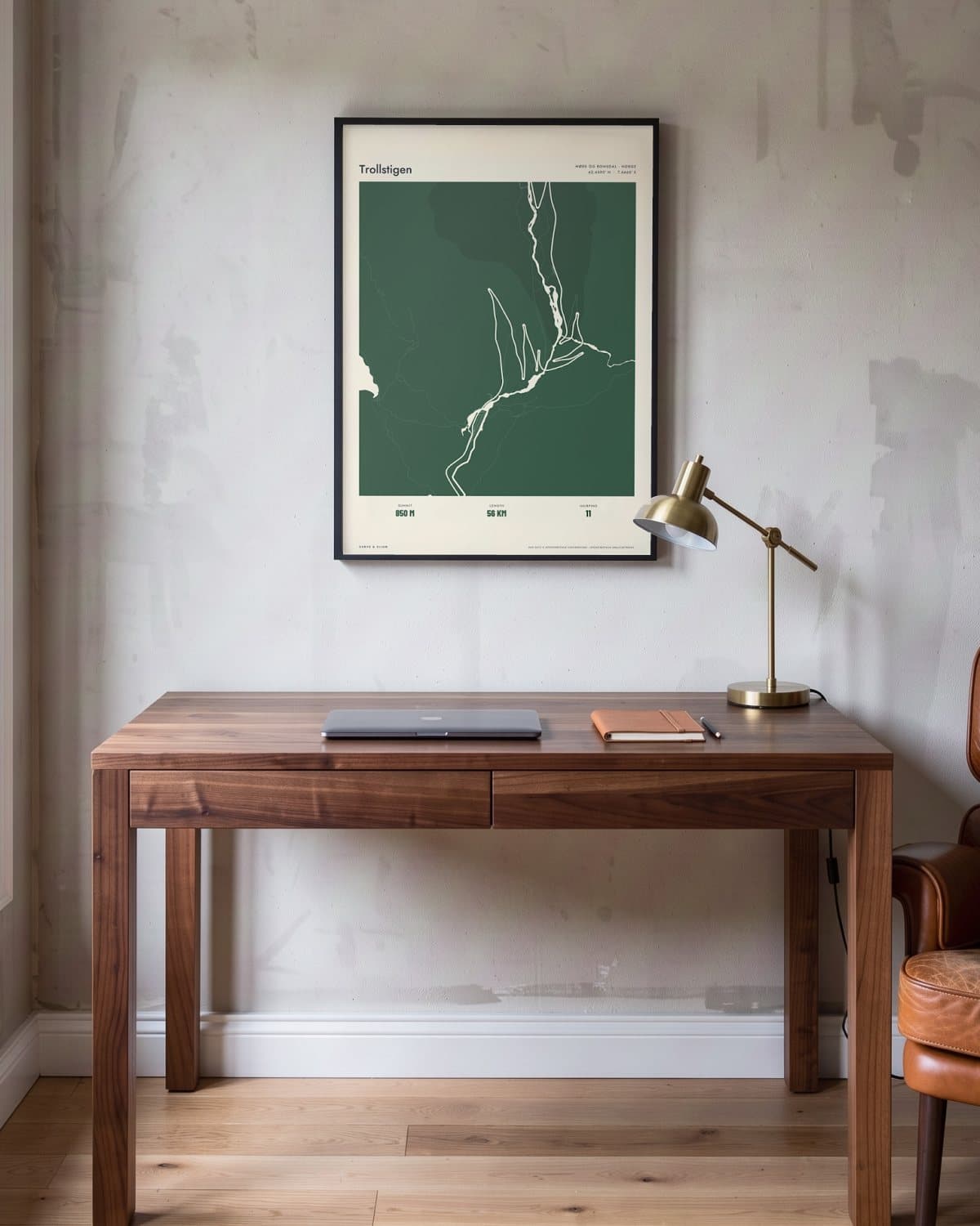 Trollstigen Atlas Forest map poster in a black frame (45 × 60 cm) in a home office