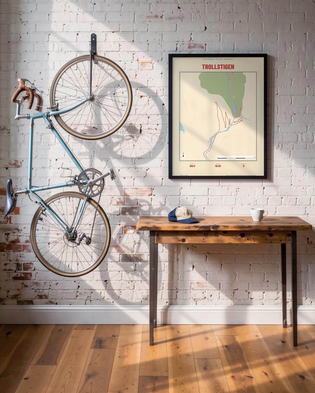 Trollstigen Carte Routière map poster in a black frame (45 × 60 cm) in a brick loft with a vintage bike